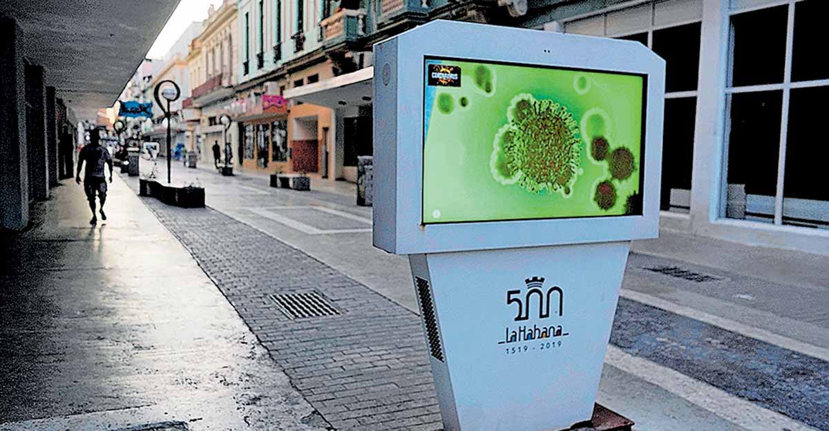 Cuba A digital screen on the street displays images of the coronavirus amid concerns about the spread of the coronavirus disease (COVID-19) in Havana, Cuba, April 10, 2021. Picture taken April 10, 2021. Reuters/Alexandre Meneghini