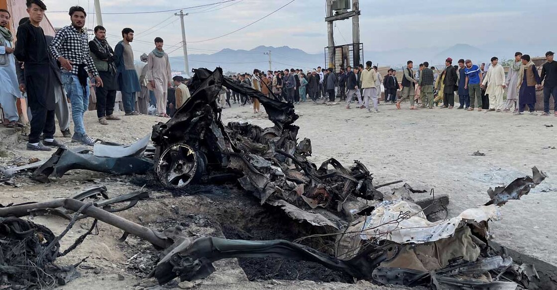 Kabul People stand at the site of a blast in Kabul, Afghanistan May 8, 2021. Reuters