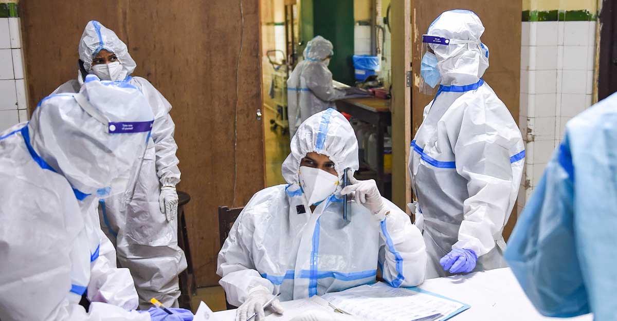 Recruit more health staff, ramp up vaccination programme: Doctors urge Kerala Govt Resident doctors, wearing PPE kits, in the COVID-19 ward of the Nowrosjee Wadia Maternity Hospital, in Mumbai, Wednesday, May 5, 2021. PTI