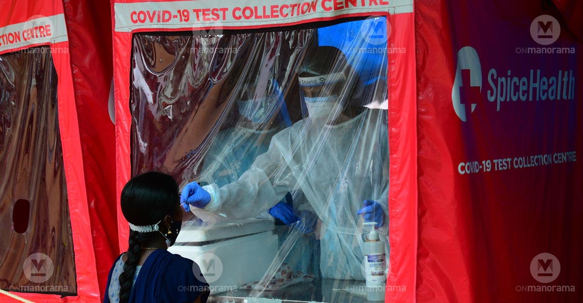 COVID-19 A medical staff taking swab sample from a person for testing.