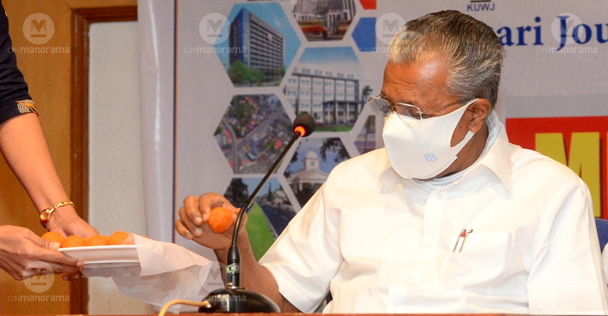 Kerala Chief Minister Pinarayi Vijayan Kerala Chief Minister Pinarayi Vijayan taking a sweet during his first press meet after getting re-elected in Kerala Assembly polls. Photo: Manoj Chemancheri
