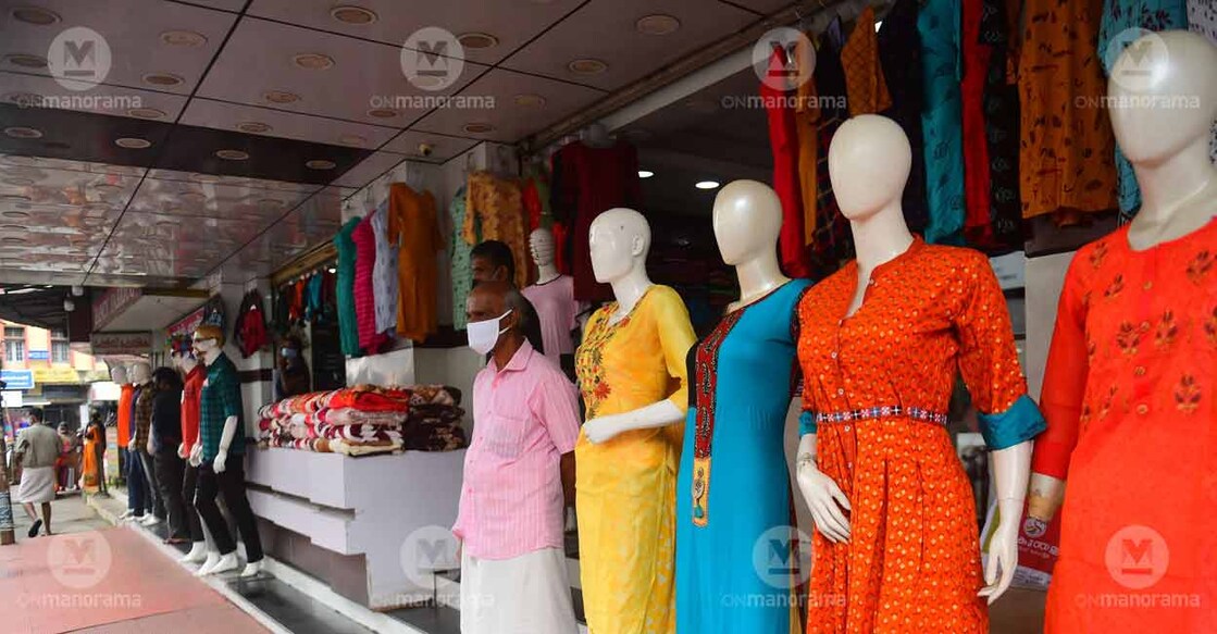 A nearly deserted textile shop in Thrissur Post Office Road on Sunday as the lockdown regulations and heavy rain mostly kept people off the streets. Photo: Russel Shahul