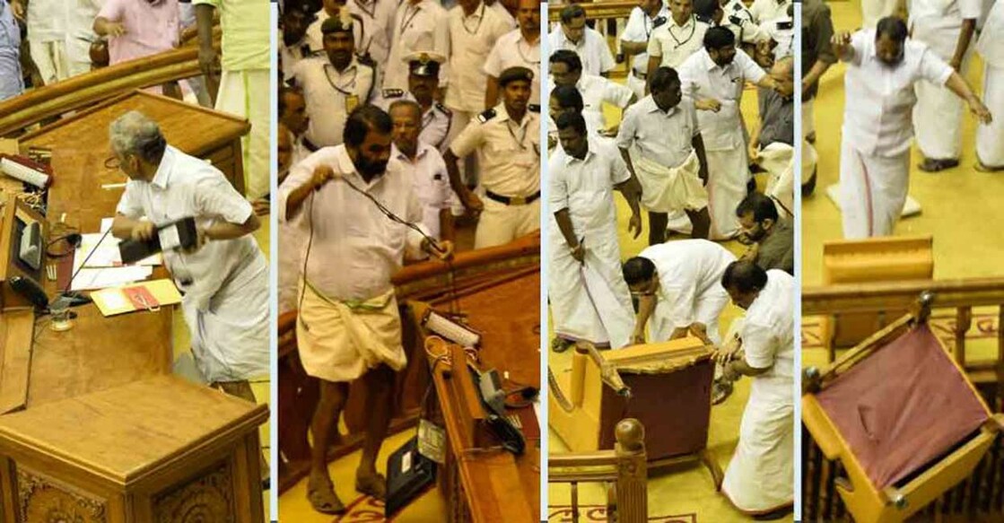 V Sivankutty standing atop a table during the ruckus in the Legislative Assembly in 2015 during KM Mani's Budget presentation.