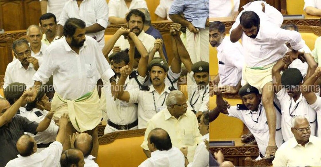 V Sivankutty standing atop a table during the ruckus in the Legislative Assembly in 2015 during KM Mani's Budget presentation