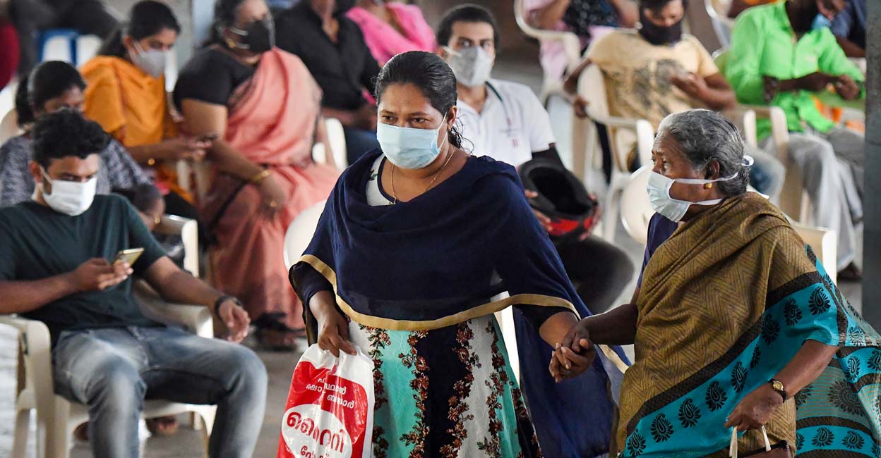 Beneficiaries wait to receive a dose of vaccine, at a centre in Thiruvananthapuram. Photo: PTI
