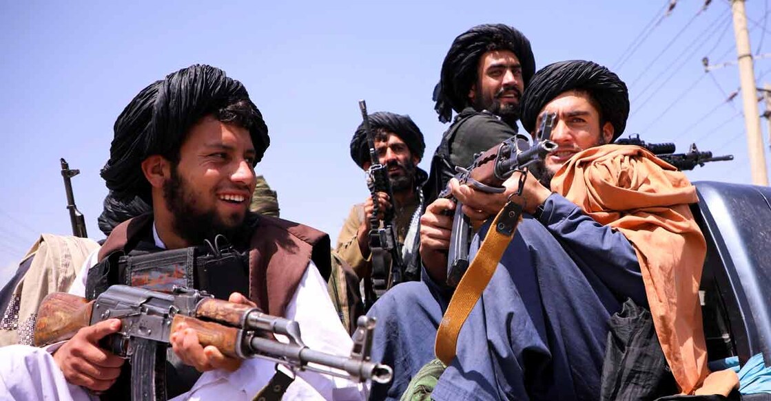 Afghan Taliban Taliban forces patrol in front of Hamid Karzai International Airport in Kabul, Afghanistan, September 2, 2021. Photo: REUTERS/Stringer