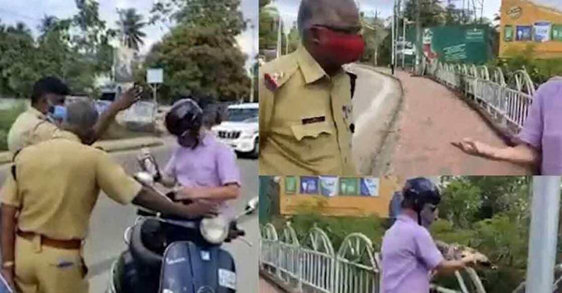 Kovalam liquor issue Swede Steven talks with policemen on the roadside on New Year's eve. Screengrab.