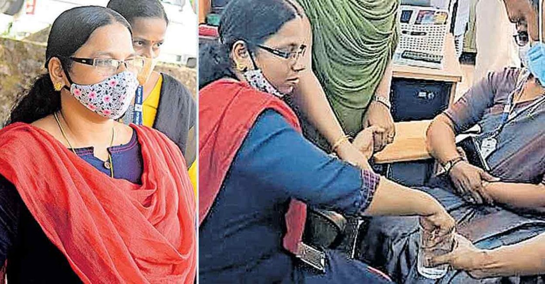 CJ Elsy being taken into custody by Vigilance officials in the MG University campus in Kottayam on Saturday. 