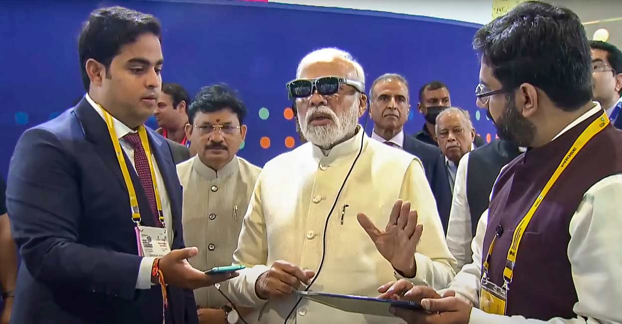 PTI10_01_2022_000024A Prime Minister Narendra Modi with Akash Ambani, son of businessman Mukesh Ambani, during the inauguration of the 6th India Mobile Congress at Pragati Maidan in New Delhi, Saturday, Oct. 1, 2022. Photo: PTI