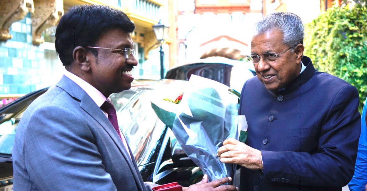 Kerala Chief Minister Pinarayi Vijayan (right) is welcomed in London on Saturday. Photo: Special arrangement