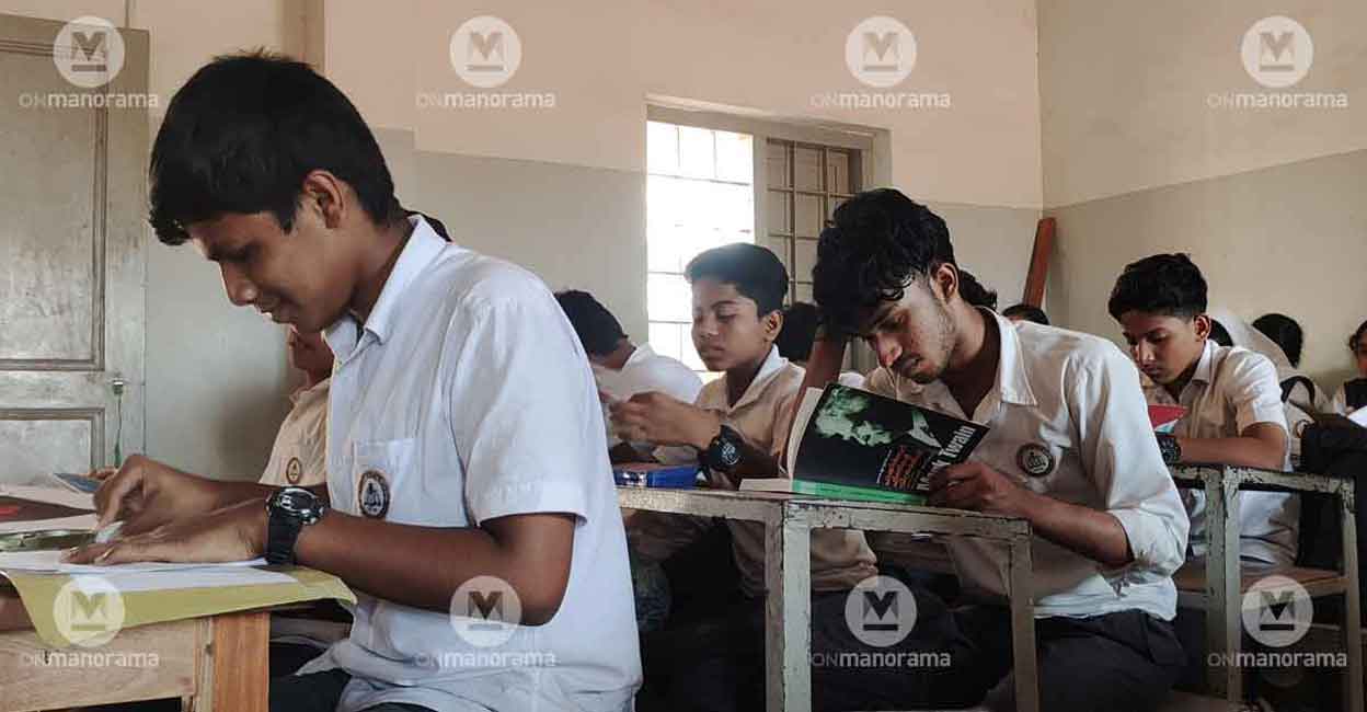 Abhya Manoj of Class X immersed in a Malayalam translation of Mark Twain during his free period. Photo: George Poikayil | Manorama Abhya Manoj of Class X immersed in a Malayalam translation of Mark Twain during his free period. Photo: George Poikayil | Manorama