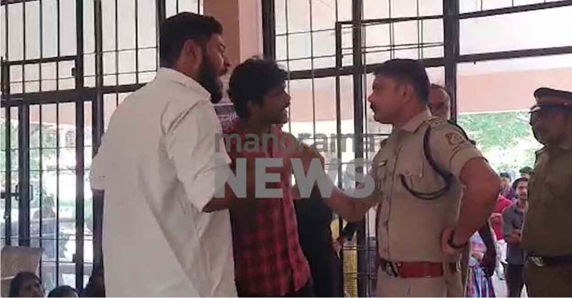 allan-main Police taking Allan Shuhaib into custody | Photo: Manorama News