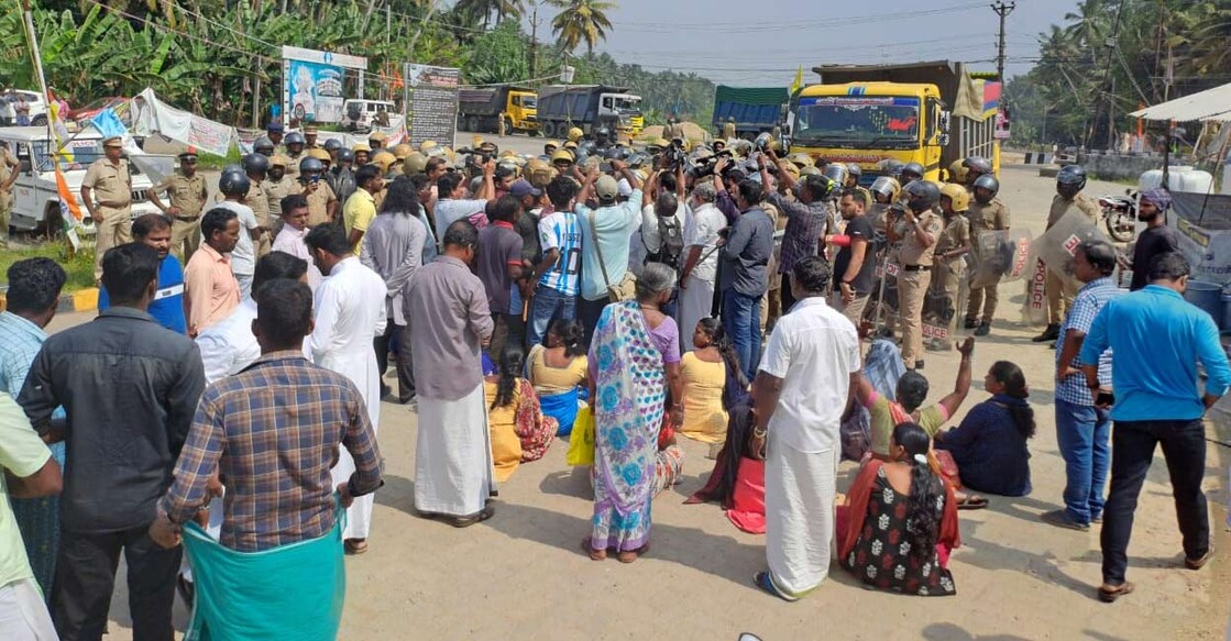 Protestors stop truck carrying construction materials for Vizhinjam port. Photo: Manorama