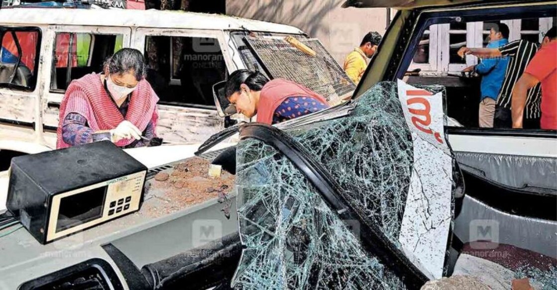 Forensic team examines the police station vehicles allegedly damaged by the protestors. Photo: Manorama. 