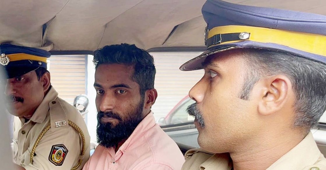 pic K M Abdul Khader being taken away to prison after he was convicted of murdering Subaida, a 60-year-old single woman, in her house at Ayambara near Periya in Kasaragod: Special Arrangement