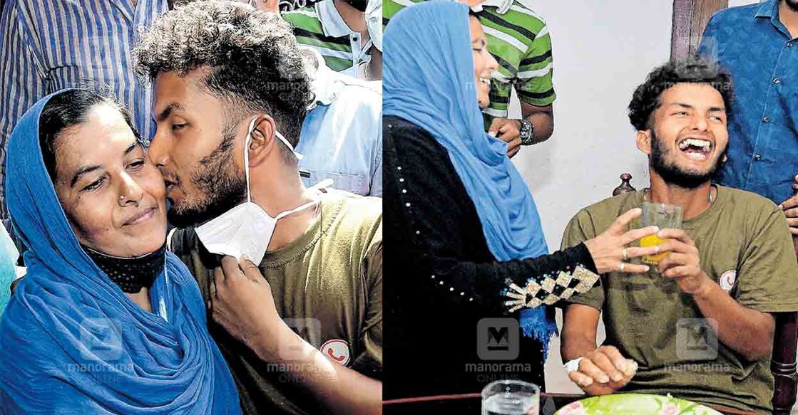Babu's mother Rasheeda welcomes him home after being discharged from hospital. Photo: Manorama