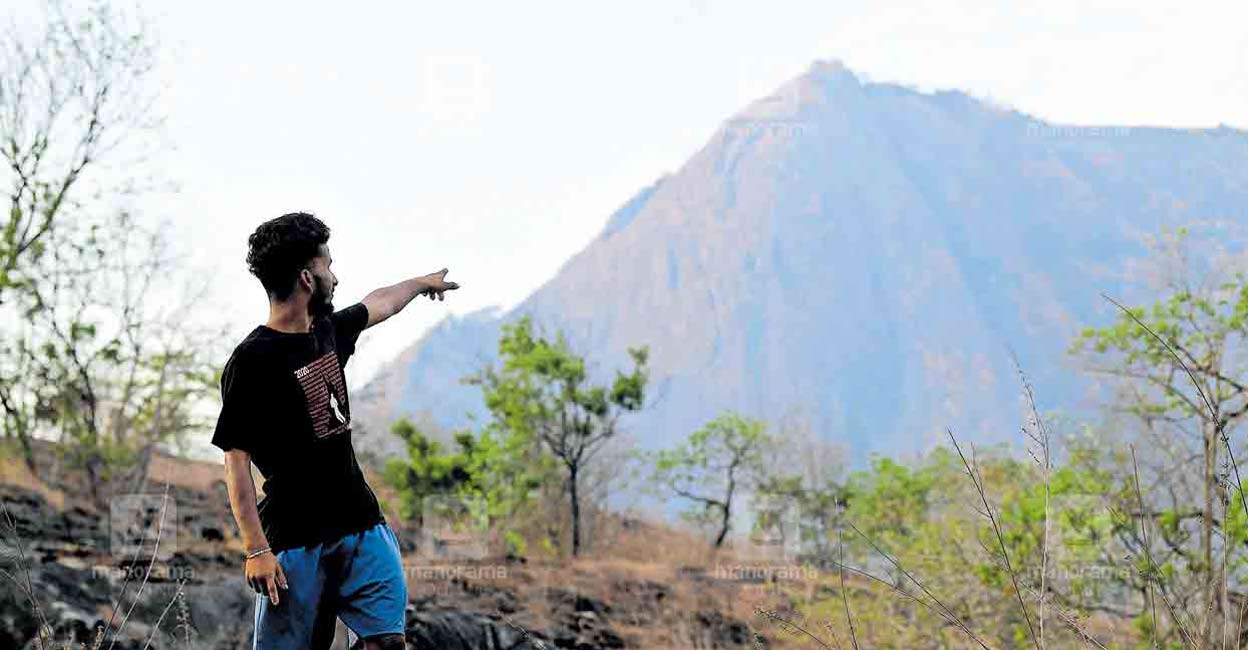 Babu showing the spot where he was trapped for 43 hours before being rescued by the Indian Army. Photo: Jins Michael