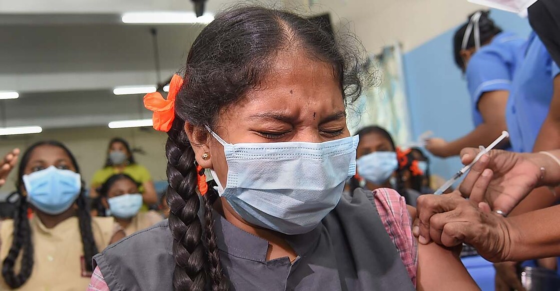 A healthcare worker administers a dose of Covid-19 vaccine to a student. Representative image/PTI