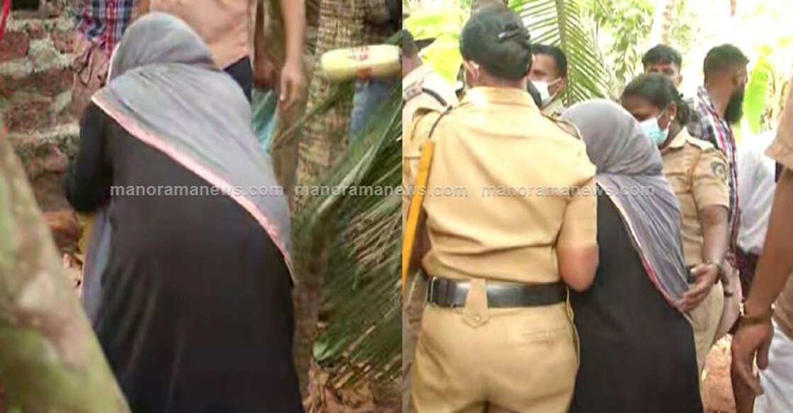 ഉദ്യോഗസ്ഥര്‍ സ്ഥാപിച്ച കല്ല് വീട്ടമ്മ പിഴുതുമാറ്റുന്നു
