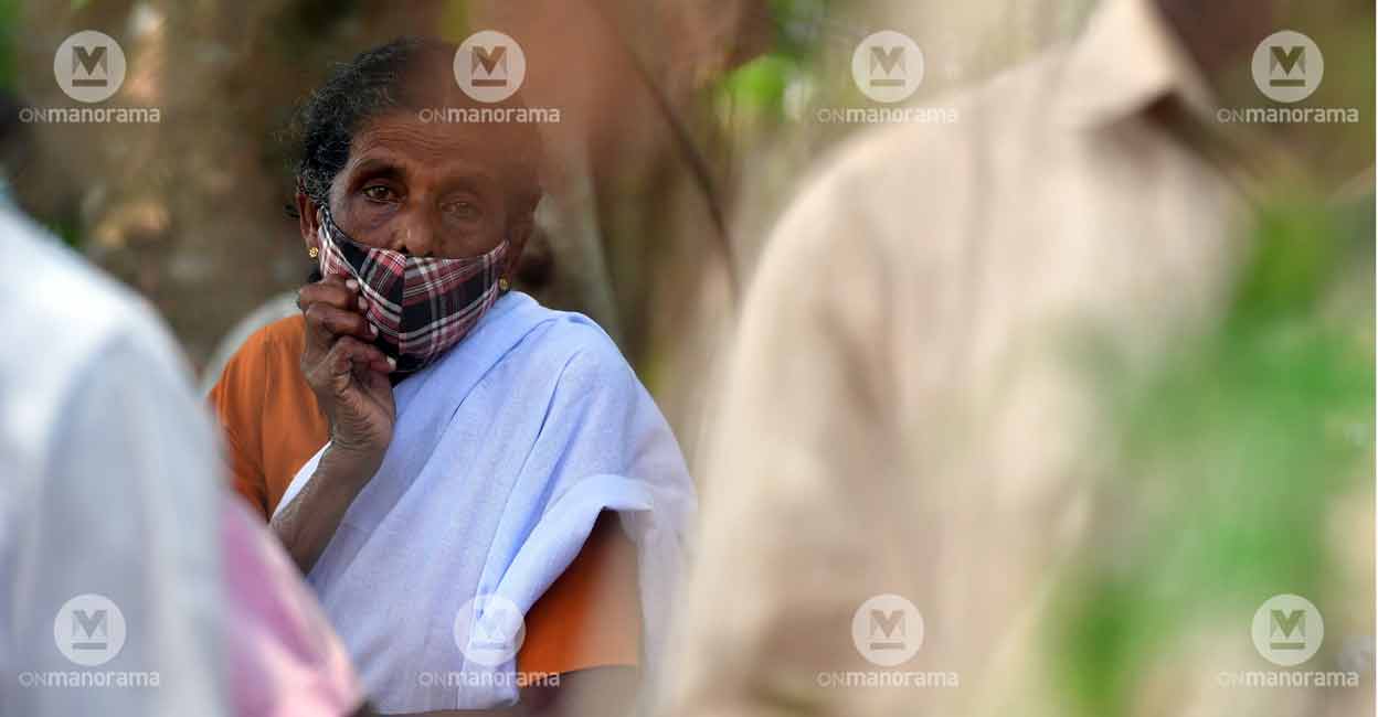 Silverline An onlooker stares as protests against SilverLine project's survey progresses in Chottanikara, Ernakulam. Photo: Josekutty J Panackal/Manorama
