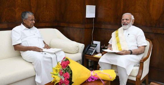Chief Minister Pinarayi Vijayan in discussion with Prime Minister Narendra Modi. Chief Minister Pinarayi Vijayan in discussion with Prime Minister Narendra Modi.
