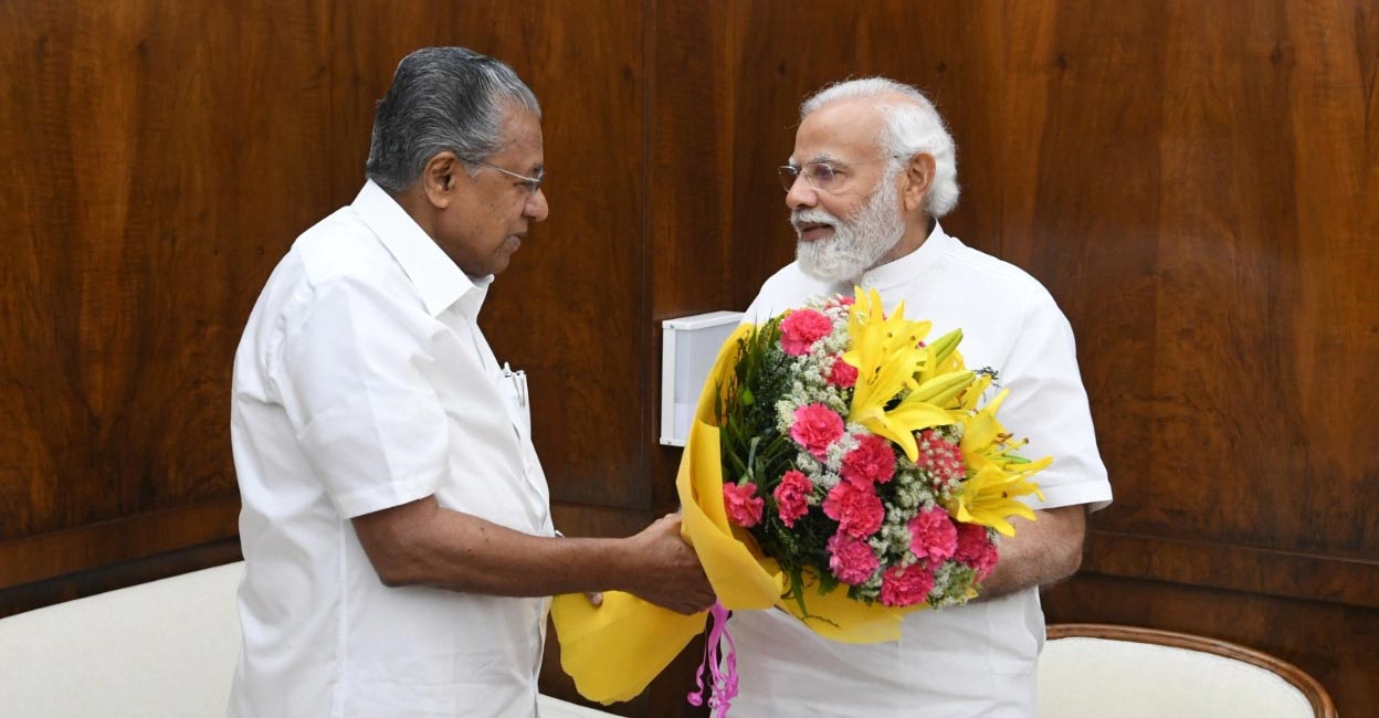 TENNIS-BARTY/ Kerala Chief Minister Pinarayi Vijayan and Prime Minister Narendra Modi.