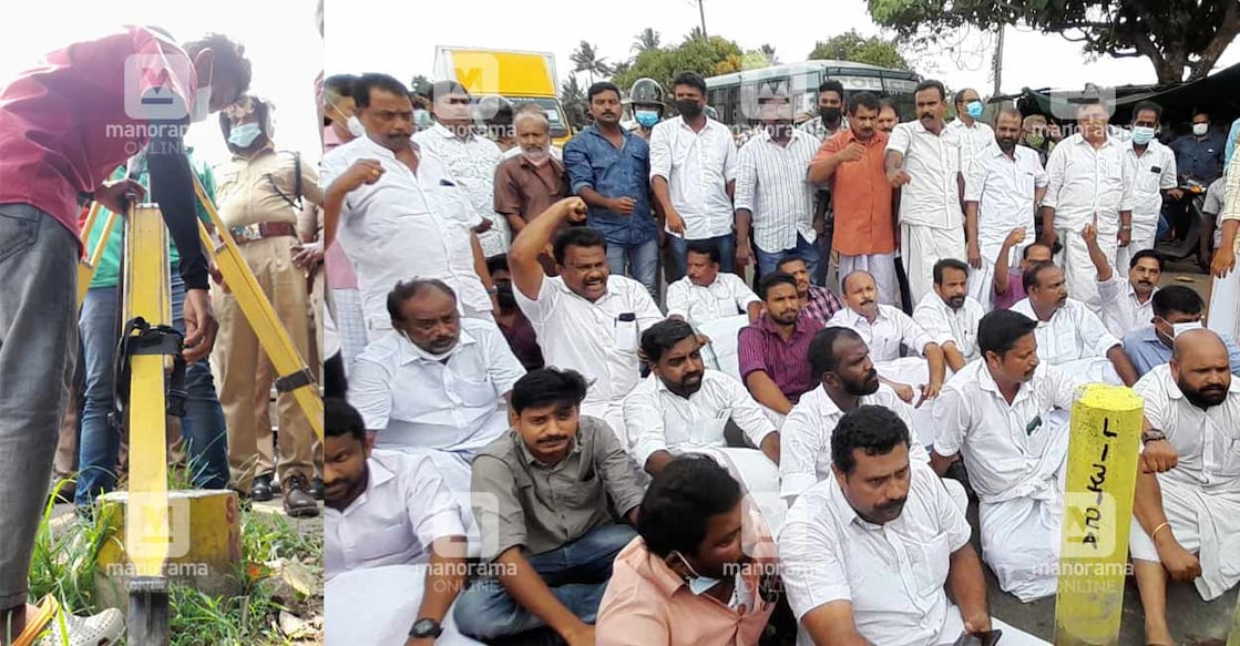 SilverLine protest Congress activists block road at Mamala in Ernakulam with uprooted survey stones. Photo: Josekutty Panackal