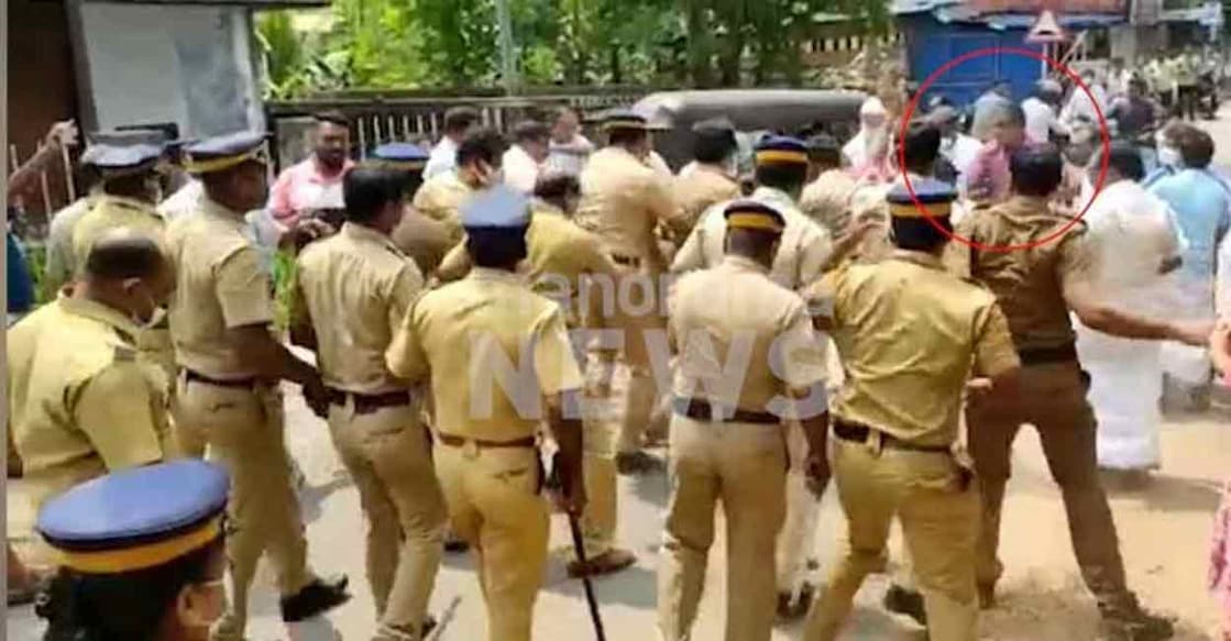 A screengrab from a footage showing Shabeer about to slap a protester. 