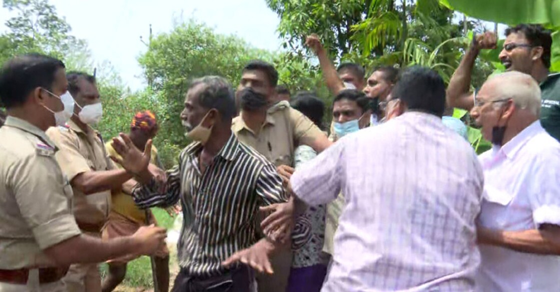 Marker stones were planted in the properties falling in the alignment of the proposed rail project at Muzhappilangad amid protest led by Congress activists and local people.