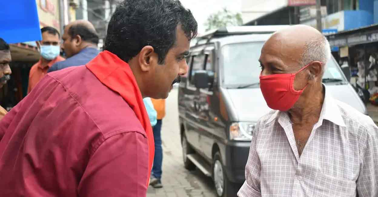 Dr Jo Joseph Dr Jo Joseph interacts with an elderly voter during his campaign. Photo: Special arrangement