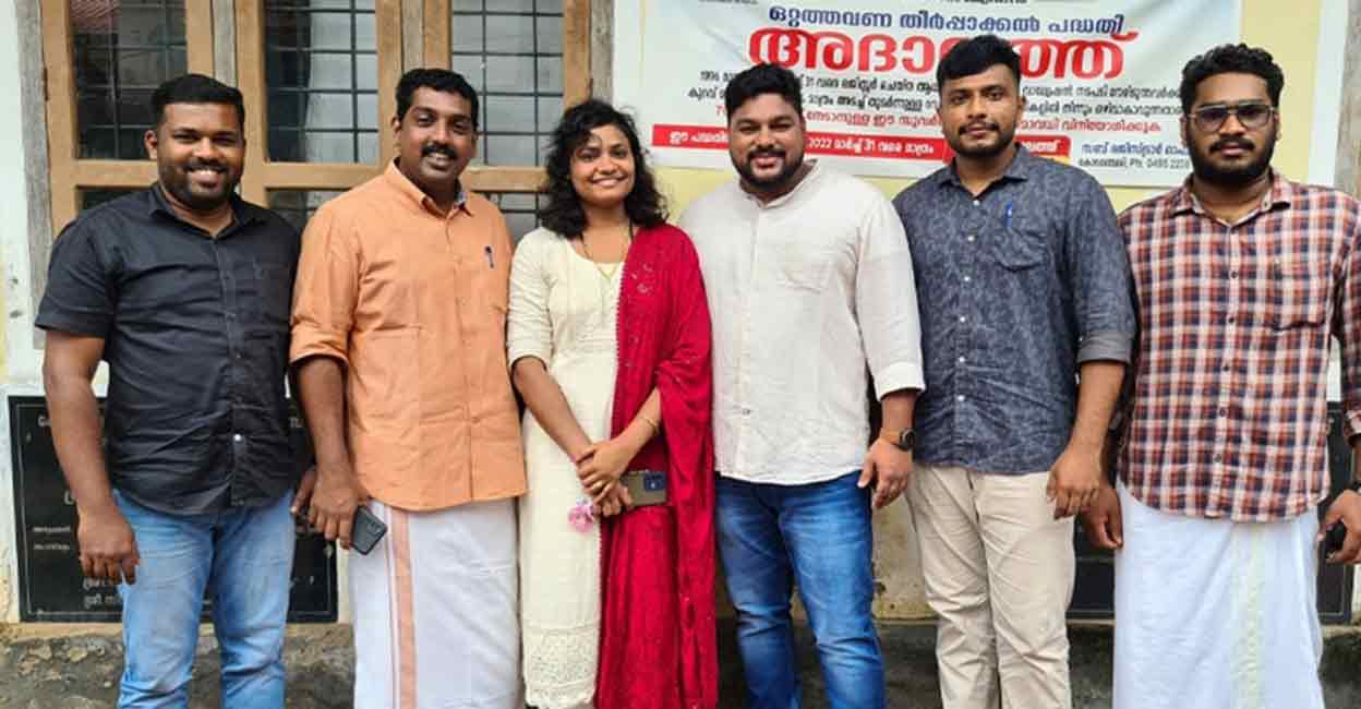 Joisna and Shejin with friends after registering their marriage.