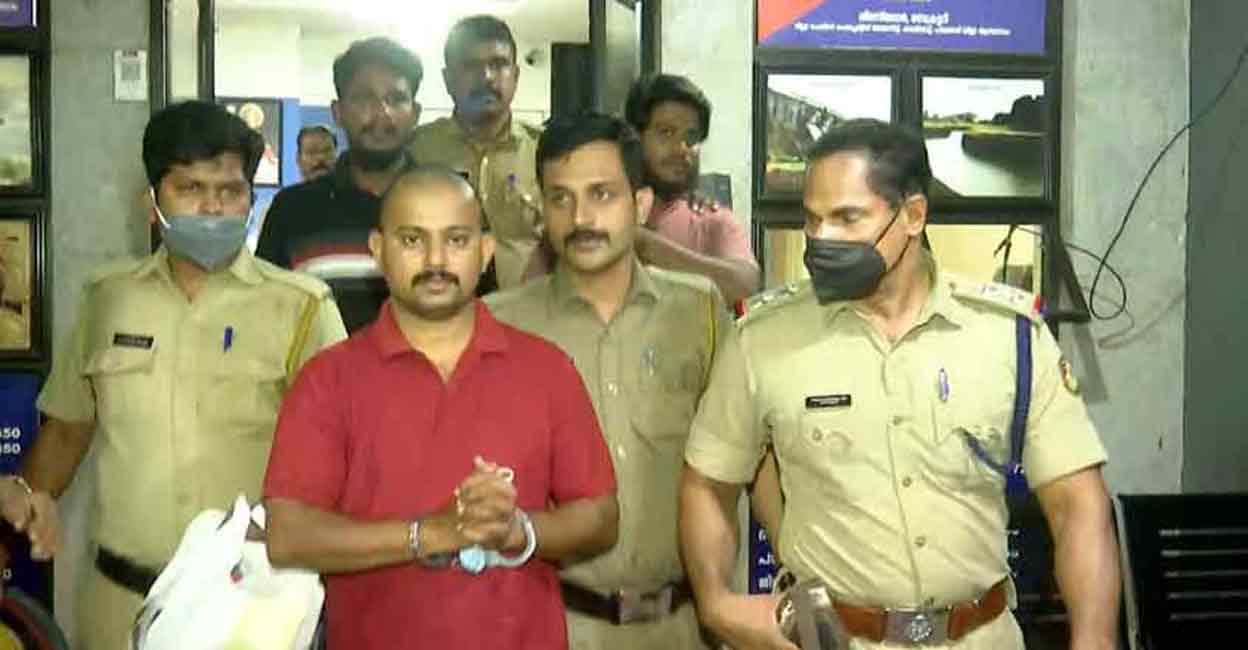 The murder accused being taken into police custody in Palakkad on Tuesday. 