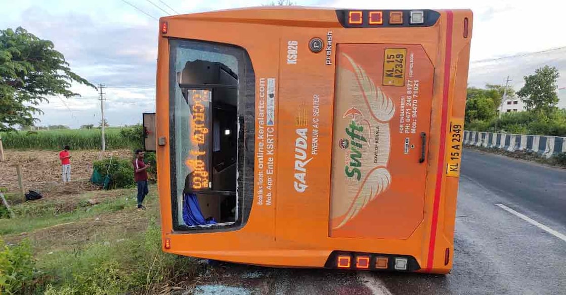 The KSRTC SWIFT bus which overturned after running over a road divider.