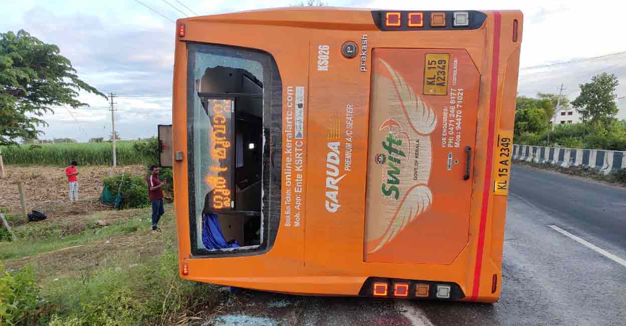 The KSRTC SWIFT bus which overturned after running over a road divider.