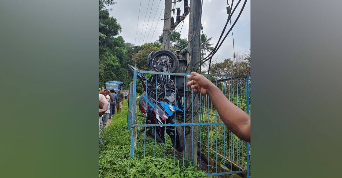 A local points to the bike suspended inside a KSEB transformer enclosure in Idukki's Vellayamkudi.