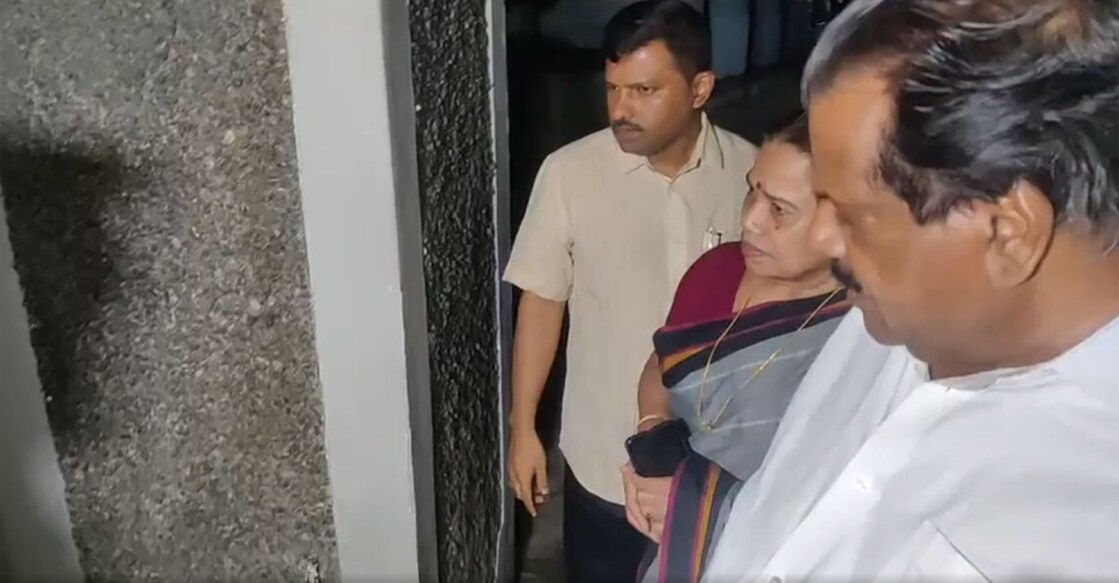 CPM leaders EP Jayarajan and PK Sreemathi look at the part of the wall of AKG Centre on which a bomb was reportedly hurled Thursday night. Screengrab