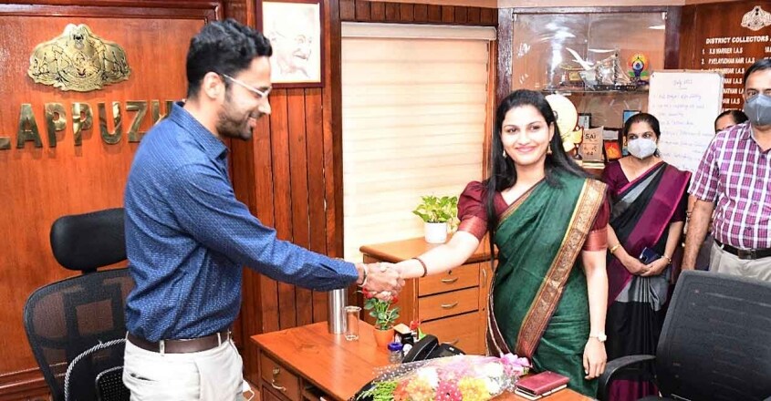 Sriram Venkitaraman takes charge as Alappuzha District Collector as former Alappuzha Collector and wife Renu Raj IAS congratulates him.  Photo courtesy: PRD