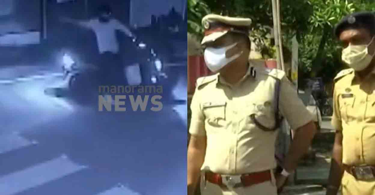 akg-centre-attack-police-3 1. A CCTV visual of the accused hurling a bomb at AKG Centre. 2. Police officers at the spot of the incident.