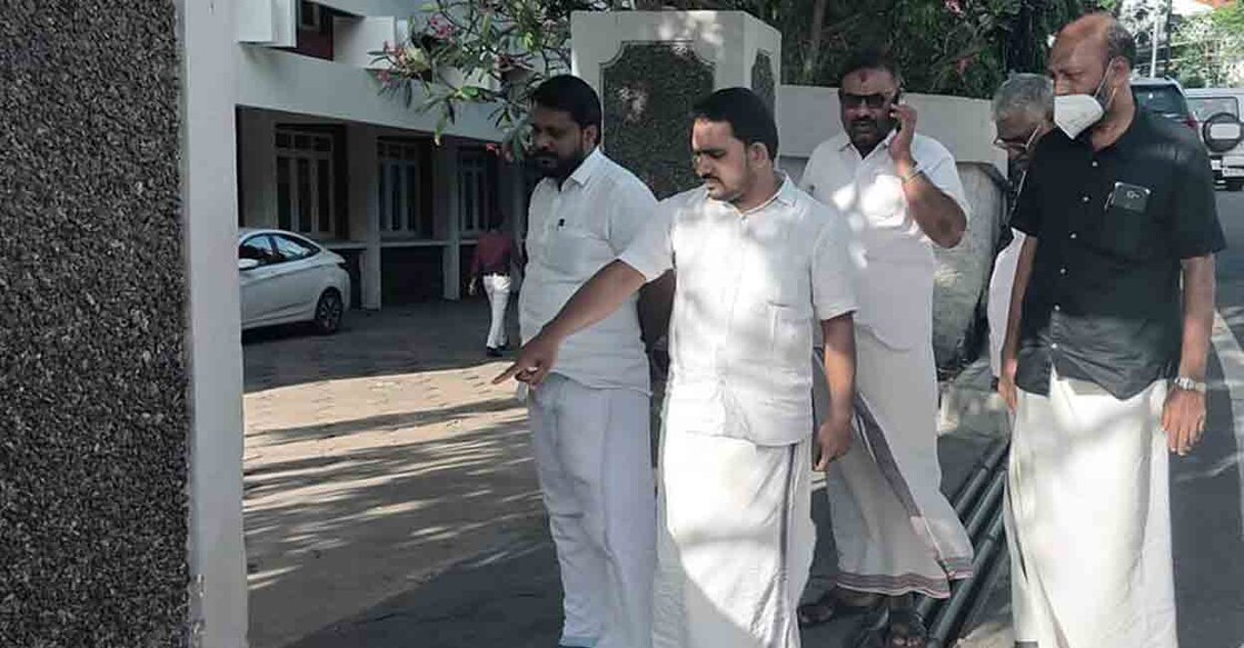 The picture, in which members claiming to be from the SDPI can be seen standing near the gate of AKG Centre, that went viral on social media. PHOTO: Facebook