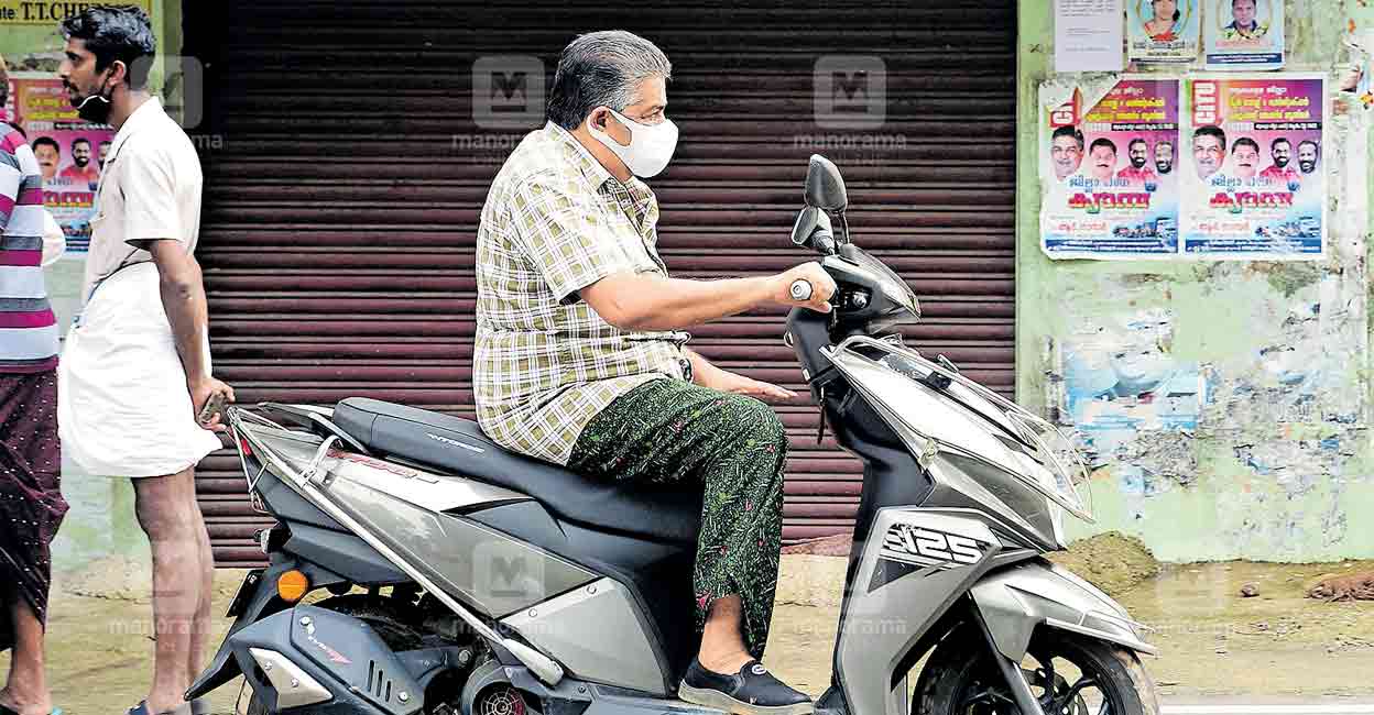 Former minister Saji Cheriyan seen riding his scooter without a helmet in Kozhuvalloor, near Chengannur, where he resides, on Friday, July 8, 2022. PHOTO: Arun Sreedhar/Manorama