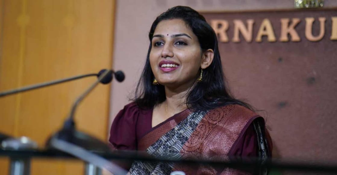District Collector Renu Raj addresses a press meet at Ernakulam Press Club. Photo: I&PRD