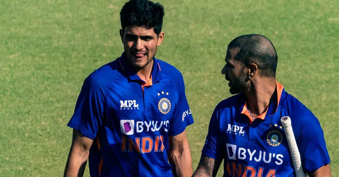 Shikhar Dhawan (R) and Shubman Gill (L) walk off the field following India's victory following the first ODI match against Zimbabwe at the Harare Sports Club in Harare on Thursday. Photo: Jekesai Njikizana/AFP