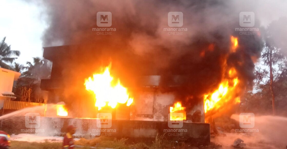 The fire that broke out at the godown in Cheruvannur TP Road on Tuesday. 