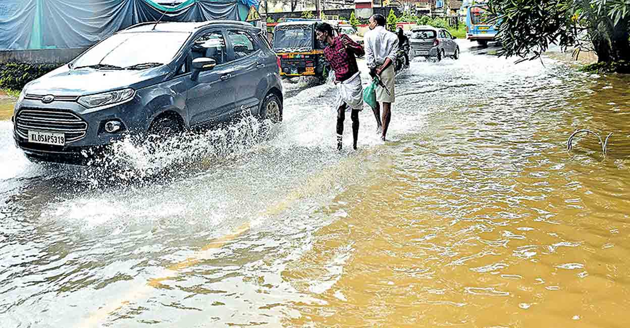Kottayam road Road in Kalachanta, Kottayam in a flooded state. Photo: Manorama