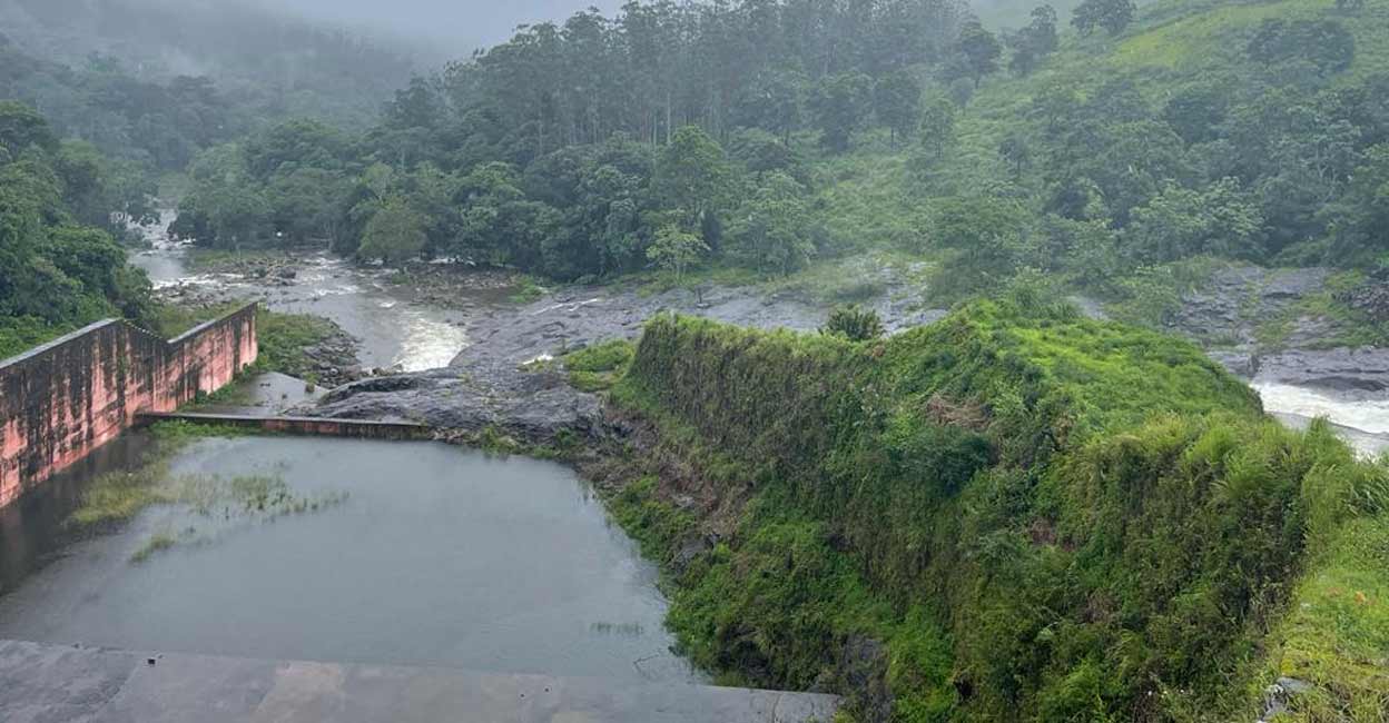 Mullaperiyar Dam Water flows from the gates of Peringalkuthu Dam after it was opened following heavy monsoon rains, in Thrissur district, on Thursday. Photo: I&PRD
