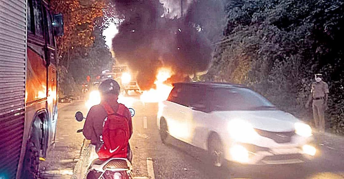 Tyres set on fire by supporters of the PFI hartal blocking a road in Kannur on Friday. 