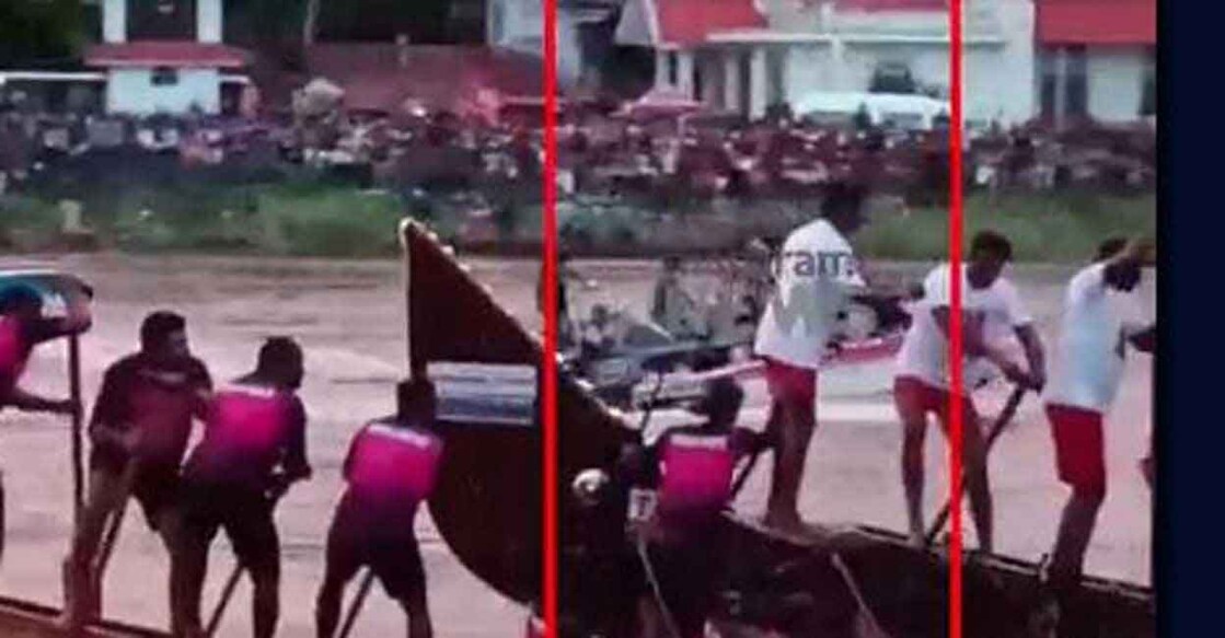 Screengrab from a video circulating on the internet shows one of Kerala police team's oarsmen pushing another team's oarsman guiding that boat's stern into the stream.