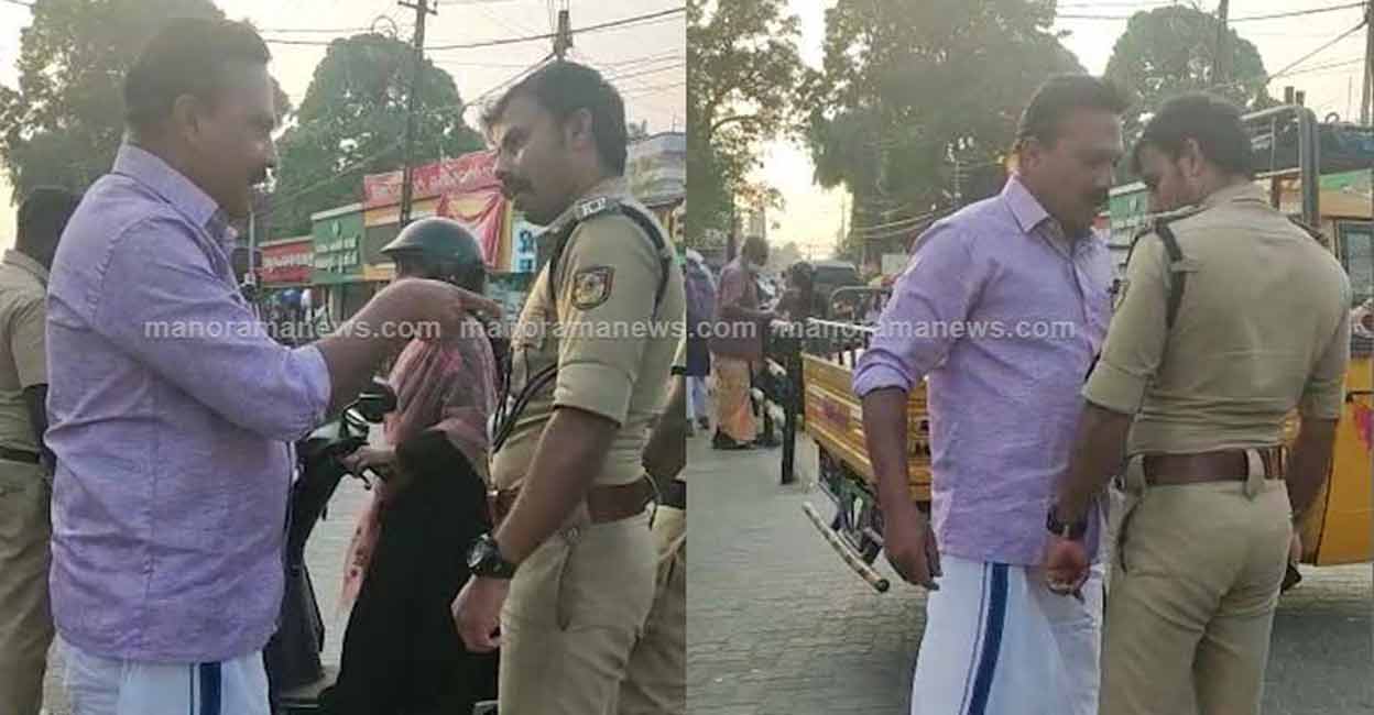 A local CPM leader, Ashkar Nampalasheril is confronting SI Sreekumar at Kayakulam. Photo: Screengrab from Manorama News