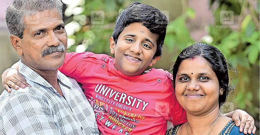 adithya-suresh Adithya Suresh with his parents. Photo: Special arrangement