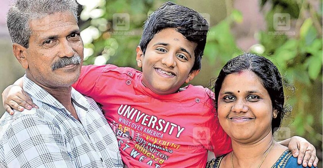 Adithya Suresh with his parents. Photo: Special arrangement